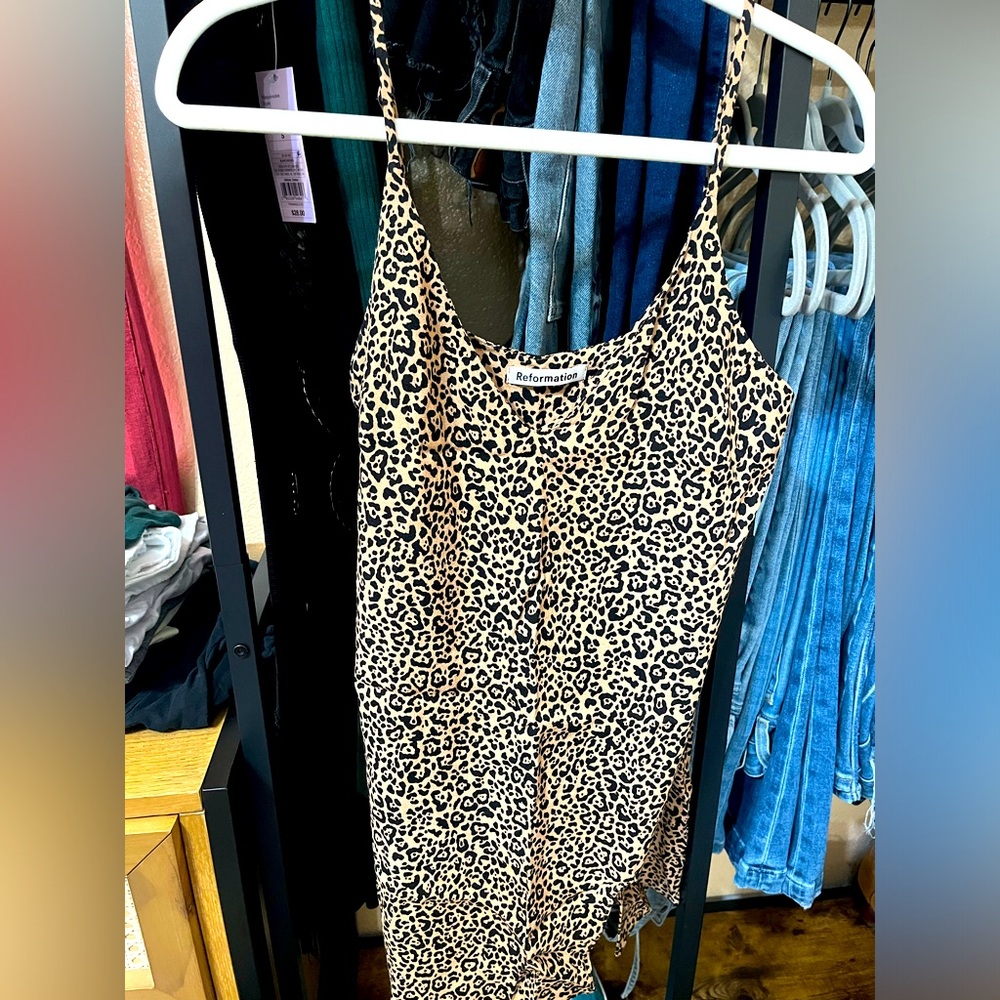 Reformation mini dress with slit.